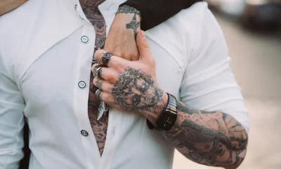 tattoos of roses on forearm